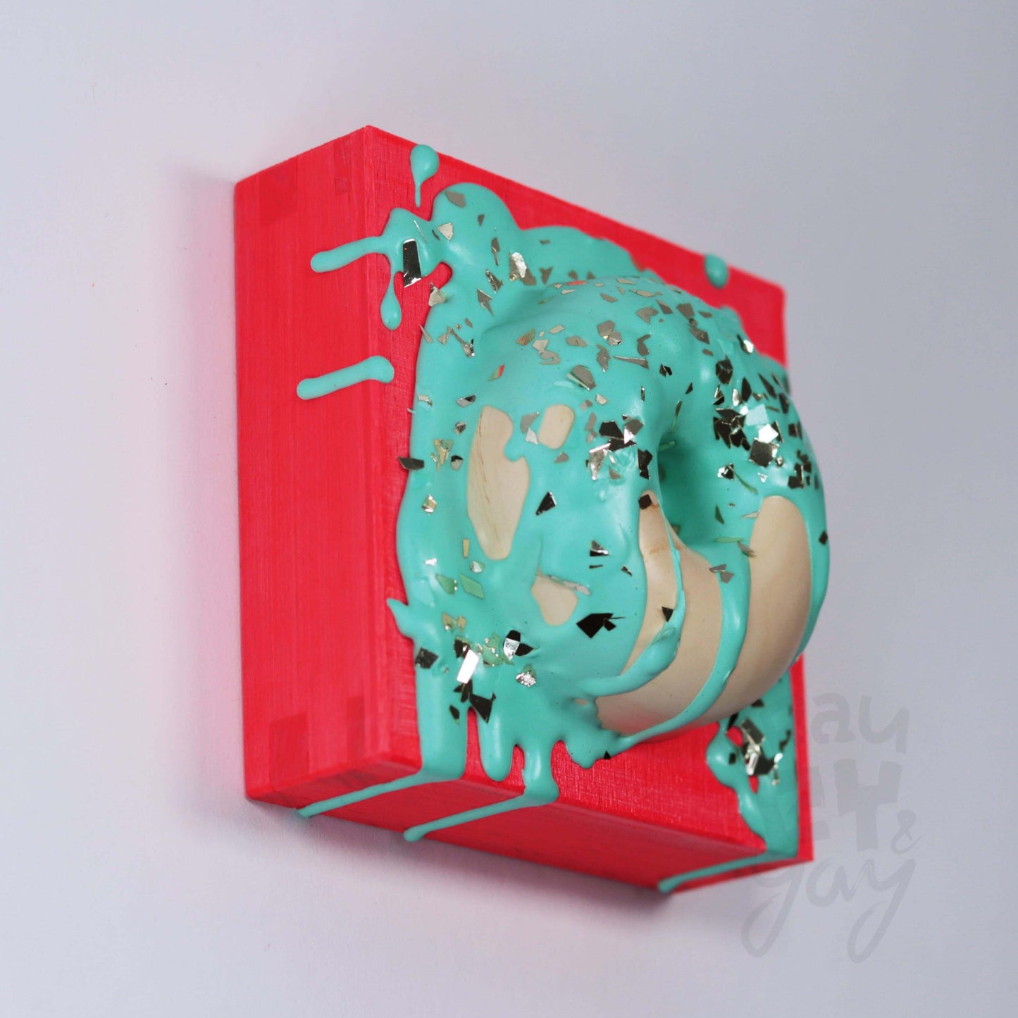 10×10×5,5 DonART mint neonrot auf Massivholz