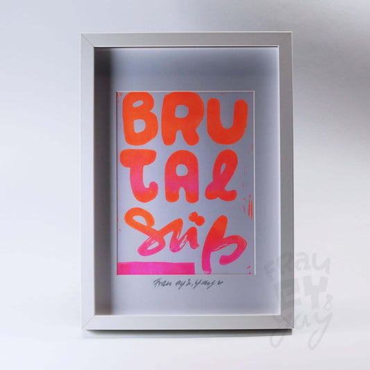Linoldruck "Brutal Süß" gerahmt, Schriftzug orange pink