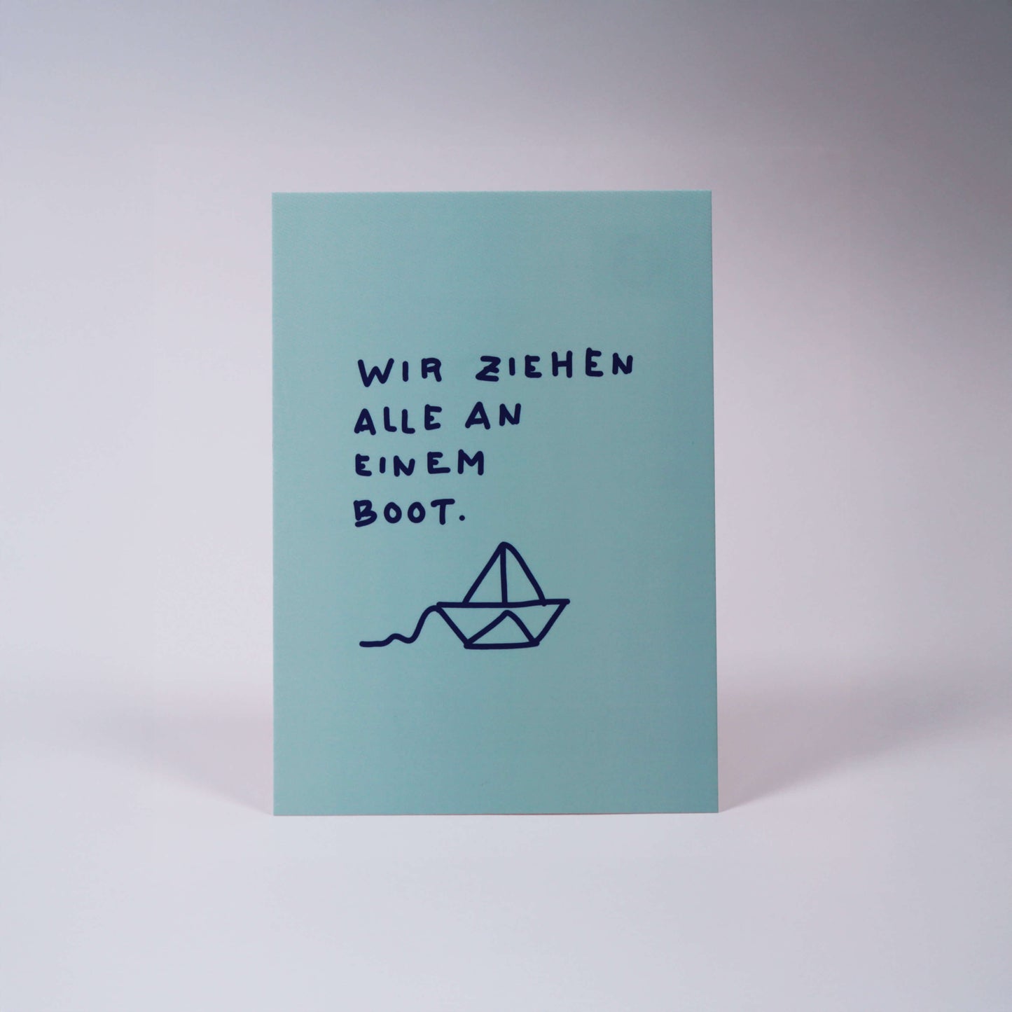 Postkarte Wir ziehen alle an einem Boot.